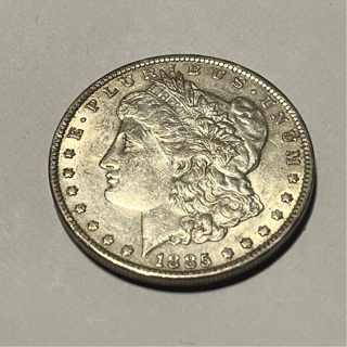 1885 O AU Silver Morgan Dollar 