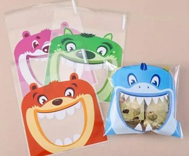 ➡️⭕(4) COLORFUL MONSTER FACE CELLO BAGS!!