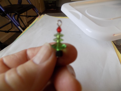 Christmas tree necklace charm made of 3 different size green glass beads, and 1 red at top