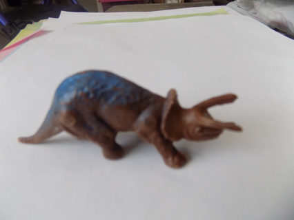 2 1/2 inch wide blue and brown triceratops dinosaur