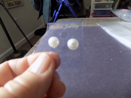 Pair of large white pearl bead post earrings