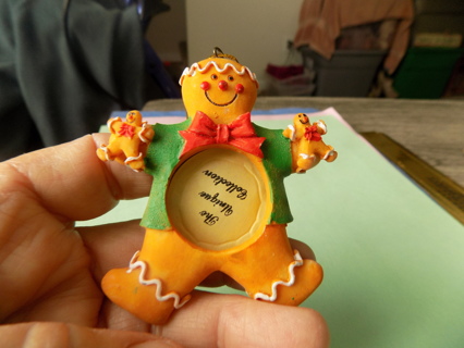 3 inch orangish resin gingerbread boy photo ornament holds 2 gingerbread cookie, green vest, rbow 