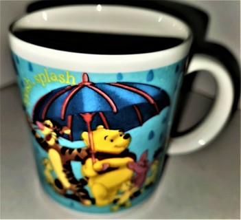 Winnie the Pooh ceramic mug - 3 1/2" x 3" diameter