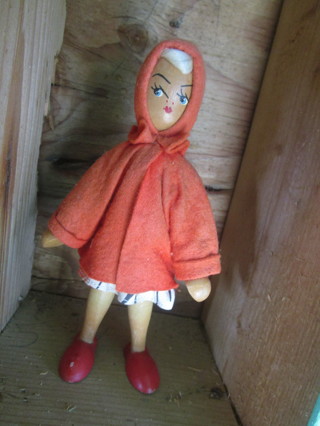 vintage wooden little red riding hood doll