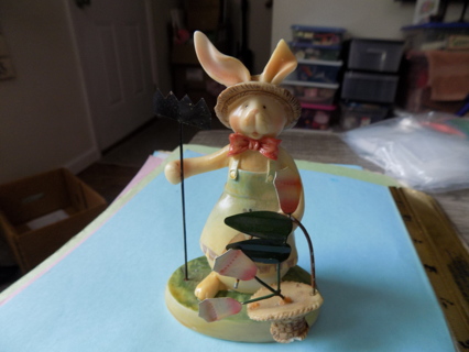 5 1/2 inch resin bunny gardener pastel colors holds hoe in hand and basket flowers