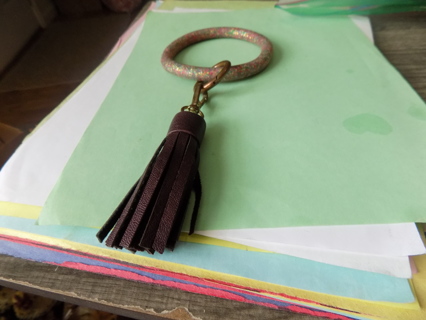 4 inch rubber sparkly keyring with brown leather tassel