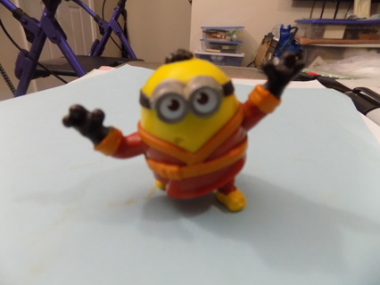 Minion 2 inch dressed in brown coat, goggles and black gloves