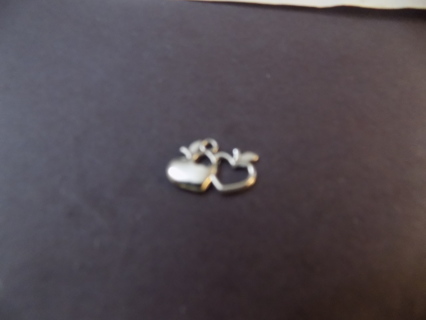 Silvertone double heart charm 1 is solid 1 is hollow