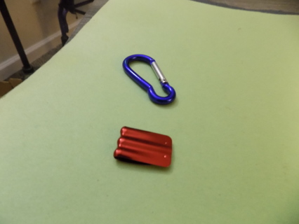 blue carbonier ring and red metal clip