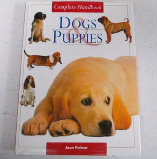 Dogs and Puppies by Joan Palmer Hardcover Book