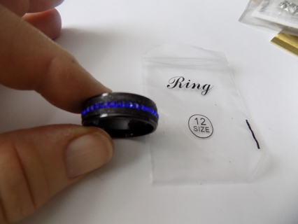 Ring, Mens Size 12 band black metal with blue rhinestones encircling it thick band