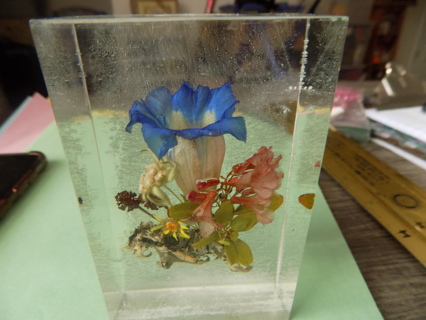 4 inch tall clear lucite block paper weight with real embedded straw flowers inside