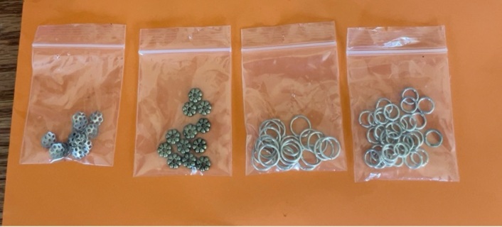 4 bags of jewelry making supplies 