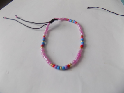 Bracelet E beads pink, red, gold, blue