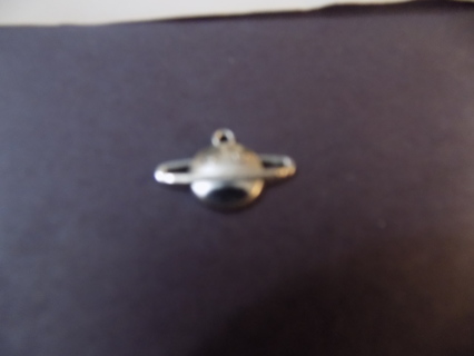 Silvertone solid planet Saturn charm with 2 stars