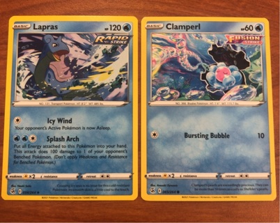 Pokemon trading cards - Lapras and Clamperl