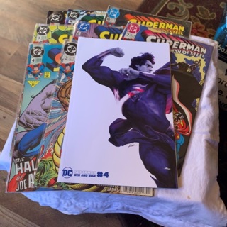 Lot of 9 Super Man comic books 