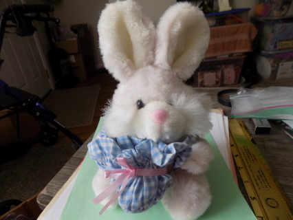 9 inch tall white rabbit plush holds blue gingham material basket