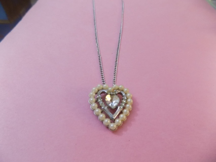 Vintage pearl heart shape pendant with another heart inside it and heart shape rhinestones