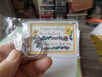 NIP acrylic keychain says anyone looking for a husband has never had one