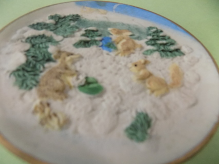 4 inch round resin plate with woodland animals, bunny squirrel in a tree