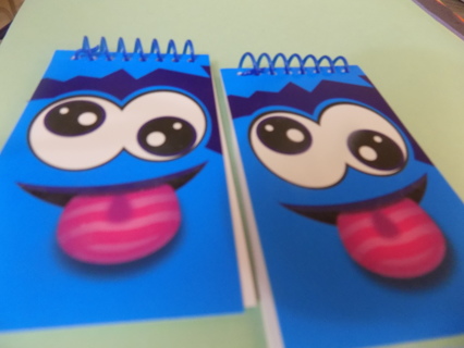 Set of 2 small spiral notebooks blue with faces 3 1/2 x 2 1/2