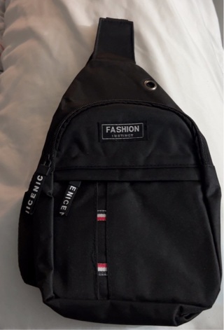 Brand New: Black Fashion 10.5”x 7.5” Backpack w/ Two Great Zippered Pockets.