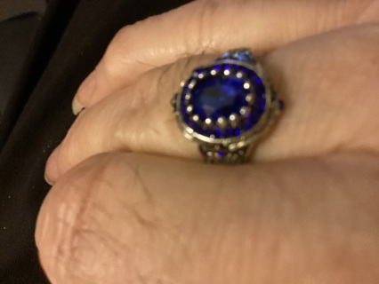 SIZE 12 RING WITH BLUE STONE