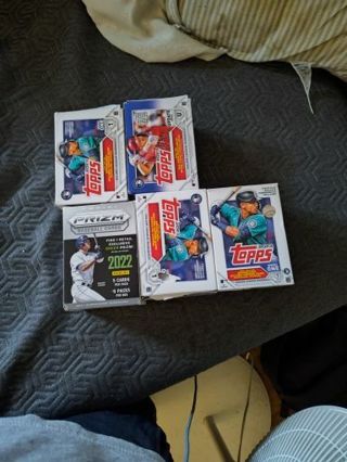 5 boxes of baseball and football cards