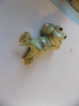 5 inch wide ceramic green frog swimming on his back