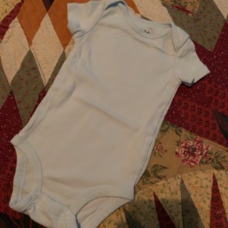 1 Used 3-6 months old blue onesie