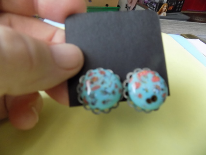 Vintage clip on earrings aqua dome background orange middle white flower painted