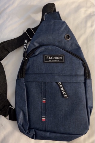 Brand New: Blue Fashion 10.5”x 7.5” Backpack w/ Two Great Zippered Pockets.