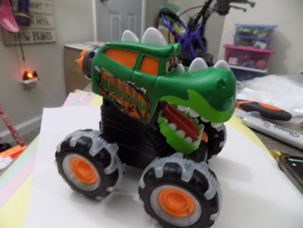 Green Dino Monster Truck push toy gray & black tires white scale on hood & mouth push toy 