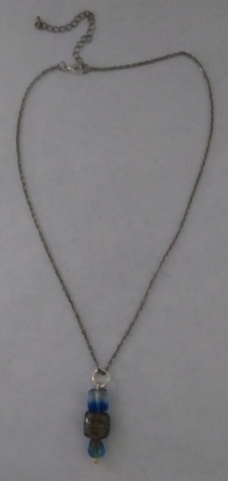Handmade silvertone/goldtone pendant necklace. Short, adjustable.