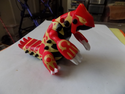 McDonalds 2015 Pokemon Omega yellow and red dinosaur flat spike tail