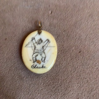 Vintage Inuit Eskimo Scrimshaw pendant with gold nugget 