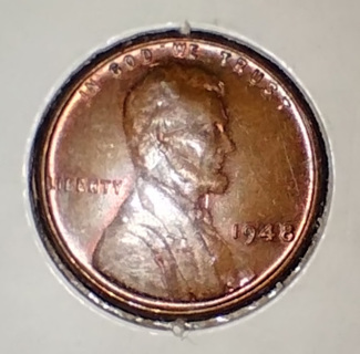 COIN PENNY 1948 UNCIRCULATED WITH SLIGHT BOUBLING ON B IN LIBERTY 99 POINT AUCTION A STEAL OF A DEAL