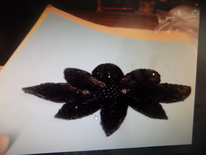 7 inch wide and 4 inch tall black sequin covered flower applique # 1