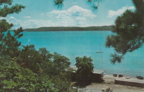 Vintage Used Postcard: gin k: Crystal Lake from Chimney Corners, MI