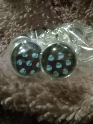 Blue skull alien print glass stud earrings new