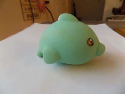 Mint green rubber dolphin tub toy