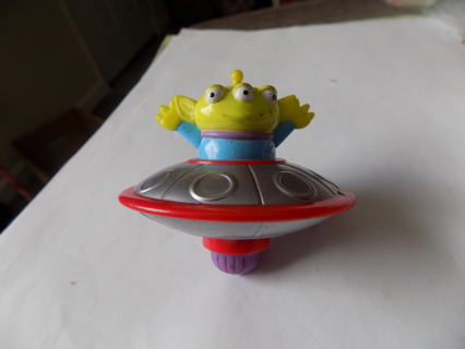 3 eye Alien in space ship top toy 2 1/2 round from Toy Story Pizza Planet arcade