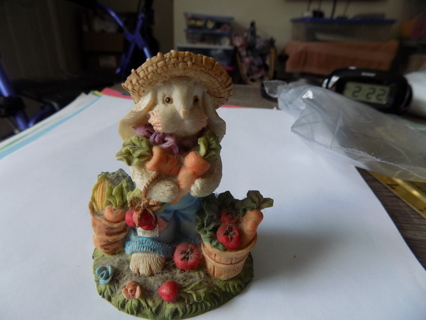 3 inch white rabbit ceramic in straw hat and armload of carrots, and bushels of veggies