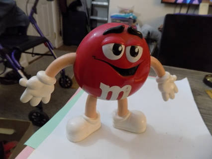 6 inch tall hard rubber M & M red figure toy