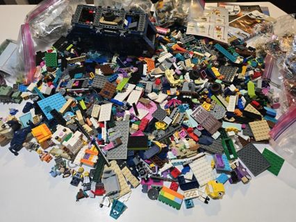 Lego mixed lot of sets mini figures etc etc. 12 lbs. Box