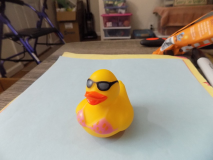 Rubber Duckie in pink bikini and sunglasses