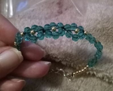 Baby Blue Crystal flower beaded bracelet make me a points offer I'm open for it