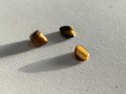 3 small tigers eye rocks