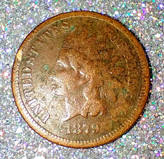 INDIAN HEAD PENNY 1879 VERY NICE CONDITION FOR BEING 144 YEARS OLD GRAB THIS BEAUTY NOW.